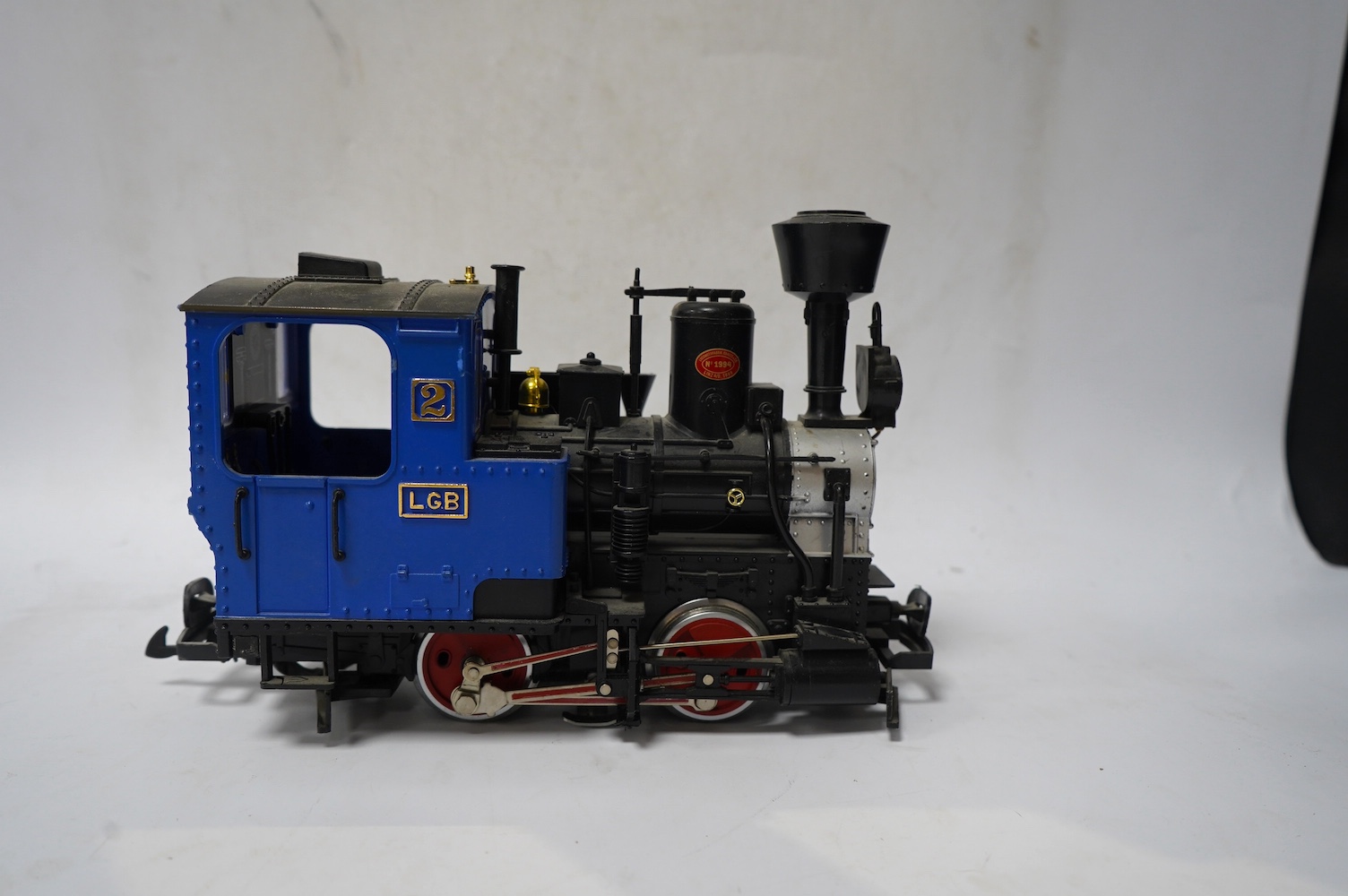 Ten Lehmann LGB G scale railway items; an OBB Bo-Bo diesel locomotive, an 0-4-0T locomotive, five bogie coaches and three 4-wheel coaches. Condition - fair, running wear and possible minor damage.